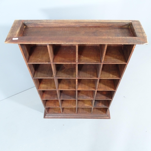 2248 - A stained pine bank of 24 pigeon holes, believed to be from a post office. 69x98x20cm.