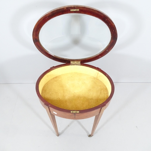 2250 - An Edwardian mahogany and satinwood strung oval bijouterie display table with lifting lid, raised on... 