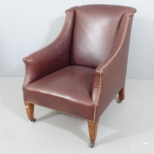 2252 - A Regency style studded leather upholstered lounge chair.