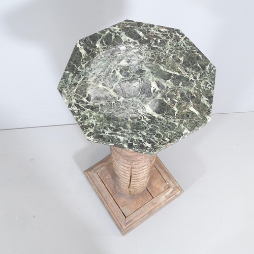 2257 - A French elm spiral-turned column with green marble top. Overall 42x110cm.