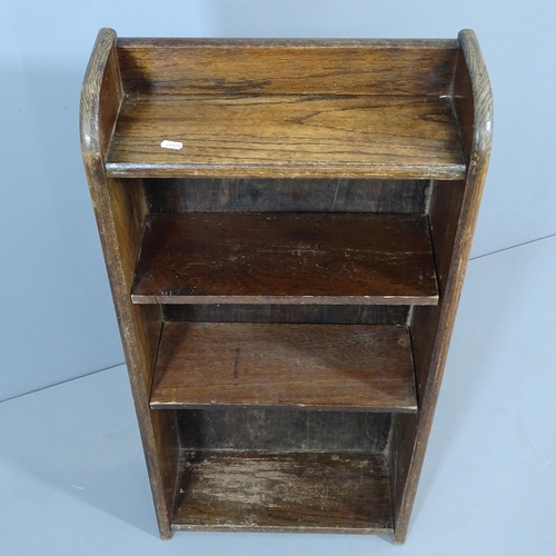 2260 - A small oak open bookcase with two adjustable shelves. 46x96x19cm.