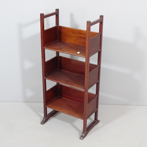 2263 - A small Arts & Crafts style mahogany three-tier open bookcase. 34x78x26cm.