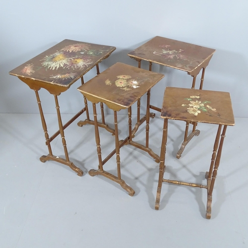 2266 - A nest of four floral painted and lacquered occasional tables. Largest 56x73x40cm.