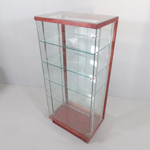 2276 - An oak and glass shop display case with four shelves and rear sliding doors. 62x138x40cm. Shelf 57x3... 