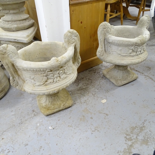 2564 - A pair of modern concrete two-section garden urns. 50x53x36cm.