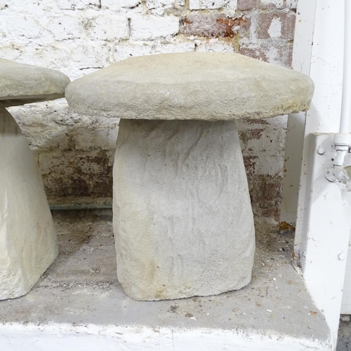 2565 - A set of four two-section staddle stone design garden ornaments. 45x50cm.