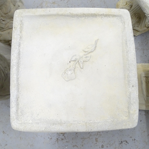 2569 - A pair of modern concrete two-section bird bath with rose decoration. 40x50cm.