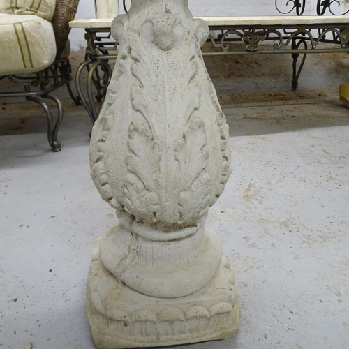 2570 - A modern concrete two-section bird bath with oak leaf decoration. 35x60cm.