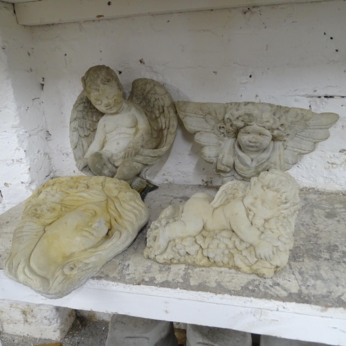 2576 - A concrete cherub wall mask, 38x27cm, two wall pockets and a cherub ornament (4).