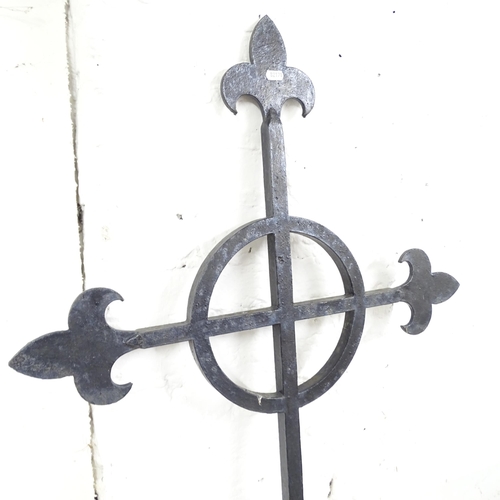 2586 - A wrought iron roof finial. 67x114cm.