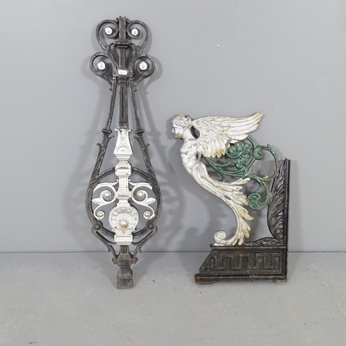 2589 - A painted cast iron wall bracket, with angel decoration (A/F) and a painted cast iron support, Heigh... 