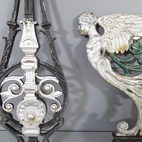 2589 - A painted cast iron wall bracket, with angel decoration (A/F) and a painted cast iron support, Heigh... 