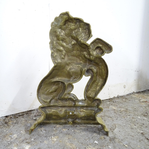 2593 - A brass lion door stop. 23x33cm.