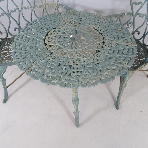 2598 - A painted cast iron two-tier circular garden table, 79x66cm, a matching bench and two chairs (4).