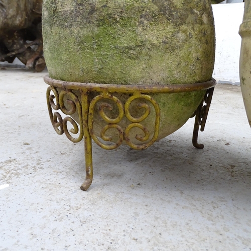 2609 - Two similar terracotta oil jars, one on stand (A/F). Tallest 60cm.