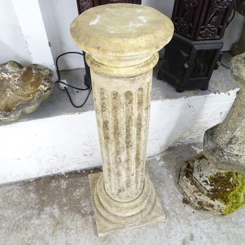 2611 - A weathered concrete column. Height 109cm.