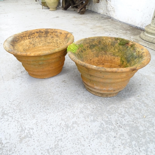 2613 - A pair of weathered terracotta circular garden planters. 46x26cm.