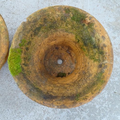 2613 - A pair of weathered terracotta circular garden planters. 46x26cm.