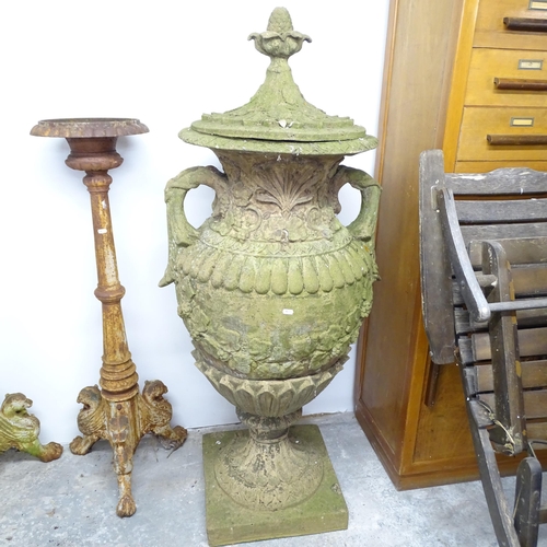 2624 - A weathered concrete three section garden urn. Height 150cm.