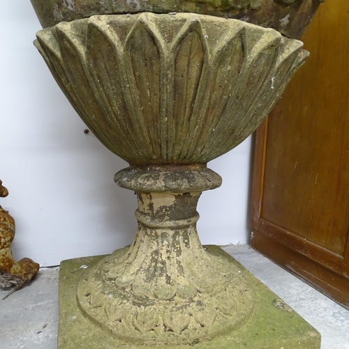 2624 - A weathered concrete three section garden urn. Height 150cm.