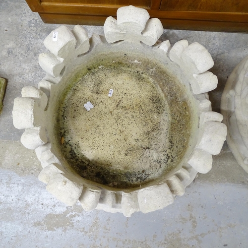 2627 - A pair of concrete gate post caps in the form of crowns. 53x28cm.