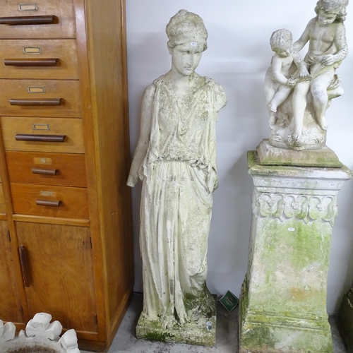 2628 - A weathered painted concrete garden statue, study of a classical female. Height 155cm.