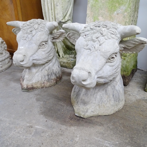 2632 - A pair of concrete bull head gatepost caps. 47x50x44cm.