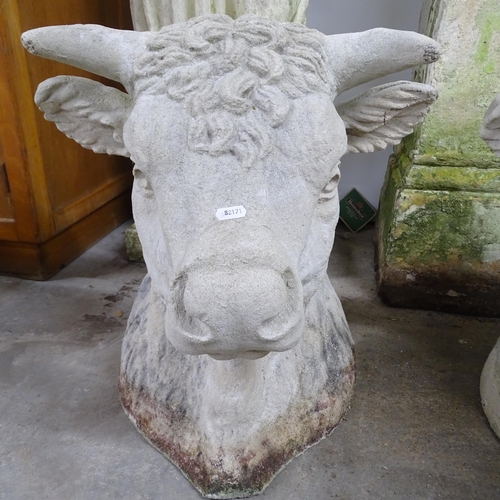 2632 - A pair of concrete bull head gatepost caps. 47x50x44cm.