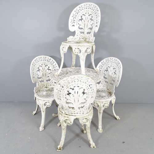 2639 - A painted metal circular garden table, 68x68cm, with four matching chairs.