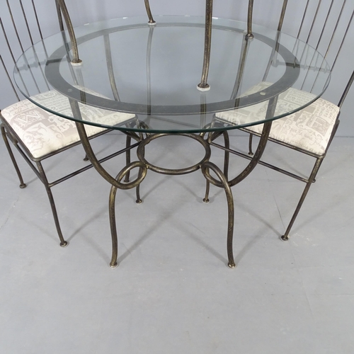 2642 - A circular glass top garden table on painted metal frame, 92x74cm, with four matching chairs.