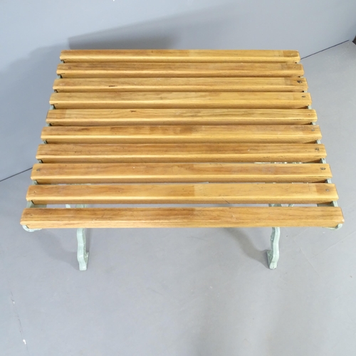 2651 - A teak slatted garden table on painted metal base. 88cm x 68cm x 68cm.