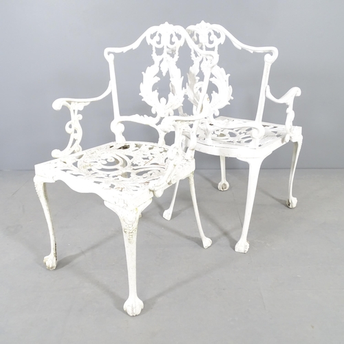 2656 - A pair of painted aluminium garden chairs, with foliate decoration and claw and ball feet.