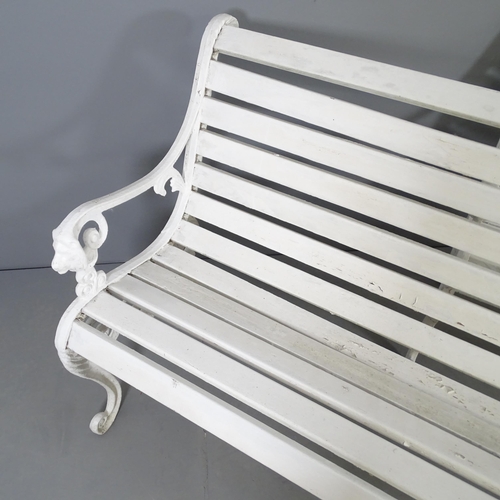 2659 - A pair of white painted slatted garden benches with cast metal ends. 128x82x65cm.