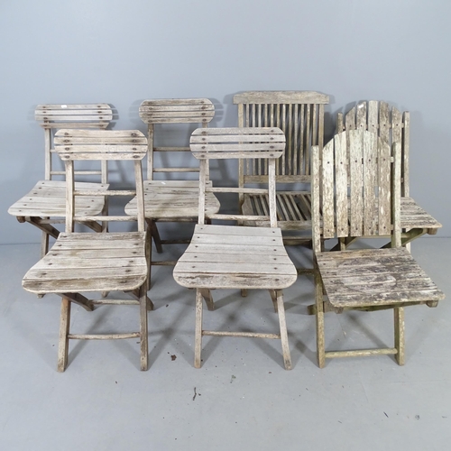 2661 - Seven various teak folding garden chairs.