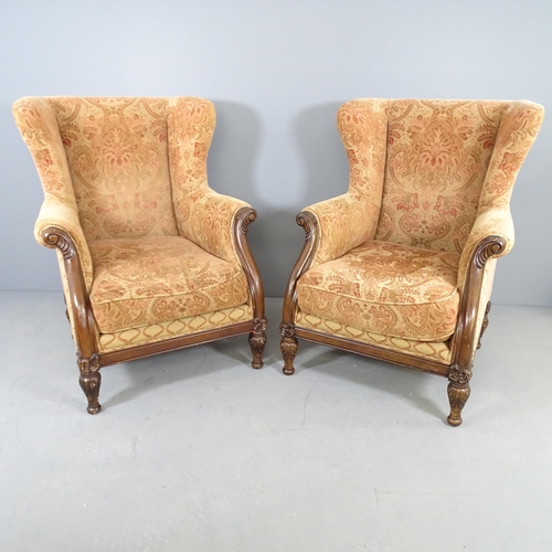 2673 - A pair of mahogany and upholstered George III style wingback armchairs. Overall 89x112x95cm, seat 53... 