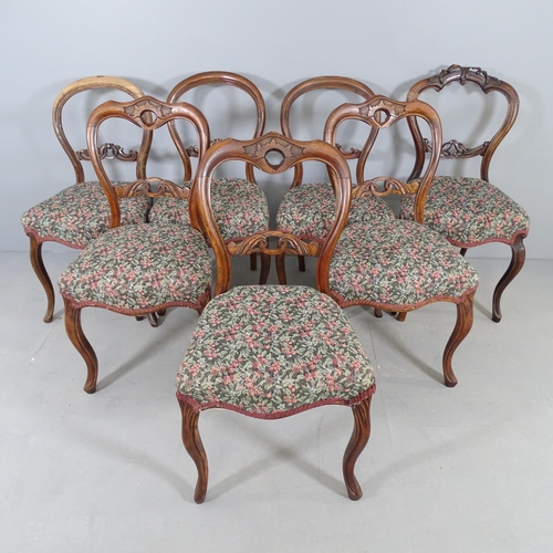 2681 - A matched set of seven mahogany and upholstered balloon back dining chairs.