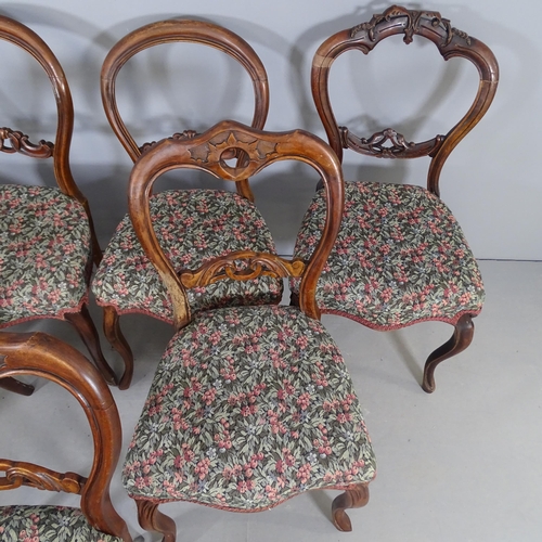 2681 - A matched set of seven mahogany and upholstered balloon back dining chairs.