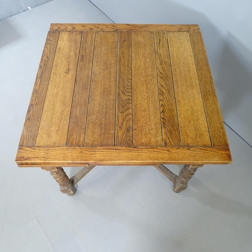 2682 - An early 20th century oak draw-leaf dining table, on barley twist legs with x-shaped stretcher. 91x7... 