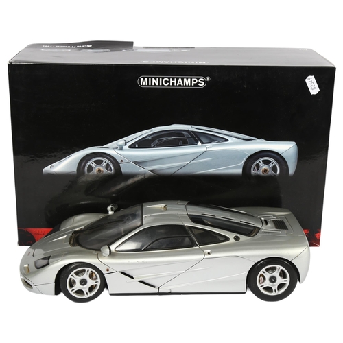 1 - MINICHAMPS - a boxed 1:12 scale 1994 McLaren F1 Roadcar model by Minichamps, in original box