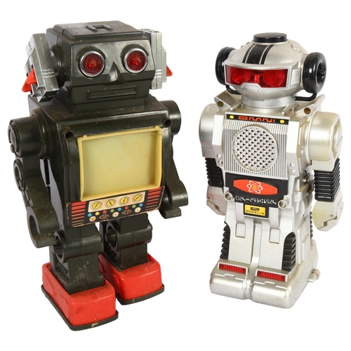 137 - A 1985 New Bright Company Magic Mike talking battery-operated robot, and a Vintage TV robot battery-... 