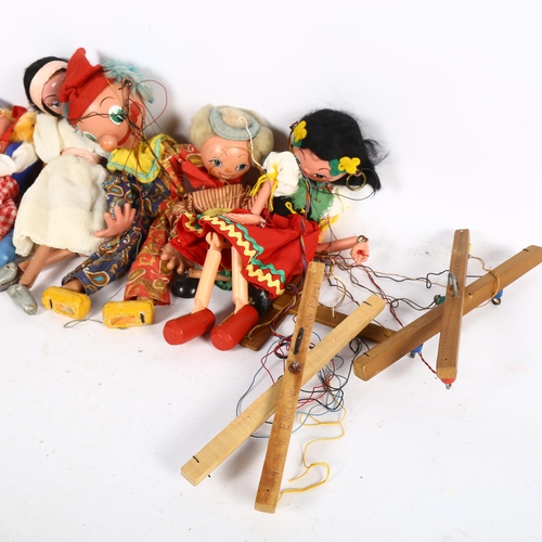 138 - PELHAM PUPPETS - a group of various Pelham Puppets, to included a gypsy girl, a Dutch girl, and a bl... 