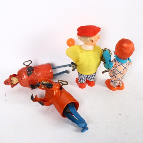 139 - LOUIS MARKS - 2 similar Louis Marks 1950s wind-up climbing firemen, ladders not present, and a wind-... 