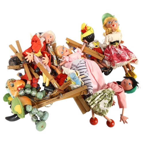 143 - PELHAM PUPPETS - a quantity of Vintage puppets, including a baby dragon, Pinocchio, Cinderella, Prin... 