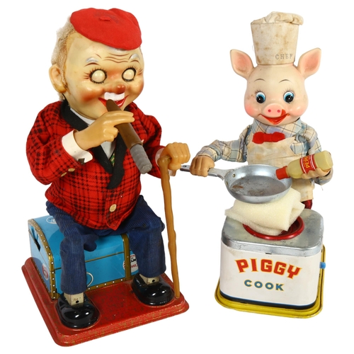 153 - A Vintage 1950s Yonezawa Japanese battery-operated Piggy Cook, and a Roscoe Toys McGregor, battery-o... 