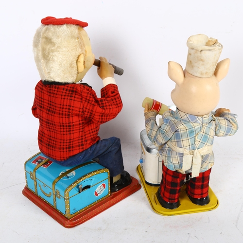 153 - A Vintage 1950s Yonezawa Japanese battery-operated Piggy Cook, and a Roscoe Toys McGregor, battery-o... 