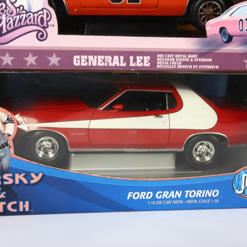 16 - THE DUKES OF HAZZARD - a 1:18 scale diecast model of General Lee by Joy Ride, on associated display ... 