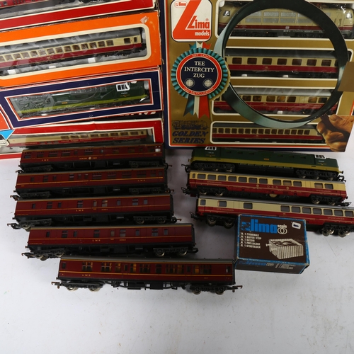 171 - LIMA - a quantity of OO gauge locomotives, carriages and other boxed items, some loose and some boxe... 