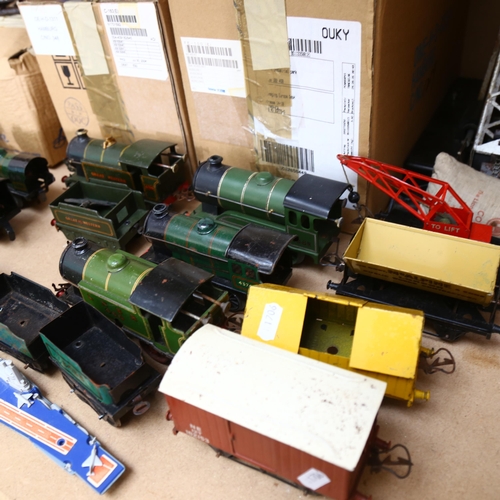 183 - HORNBY - a quantity of Vintage Hornby tinplate clockwork O gauge locomotives and associated tenders,... 