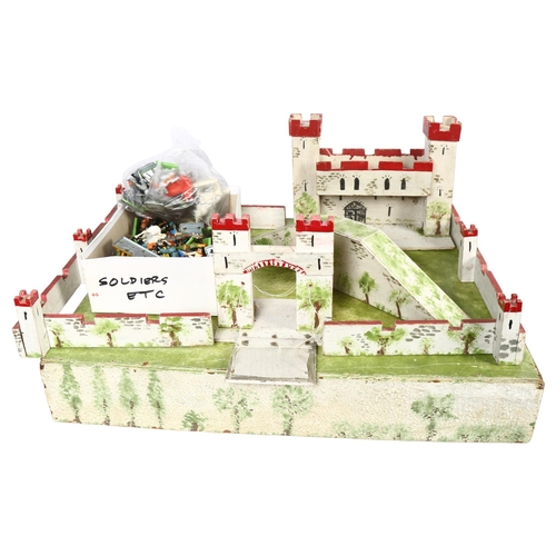 195 - A Vintage scratch-built wooden castle, with drawbridge, and a quantity of Britains and other associa... 