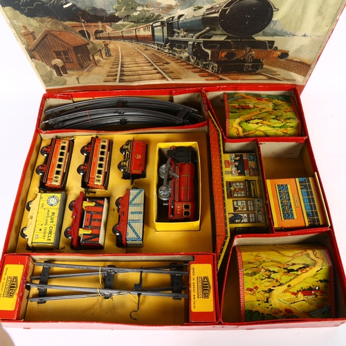 199 - METTOY - a Vintage Mettoy Playthings clockwork O gauge combination passenger train set, tinplate tra... 